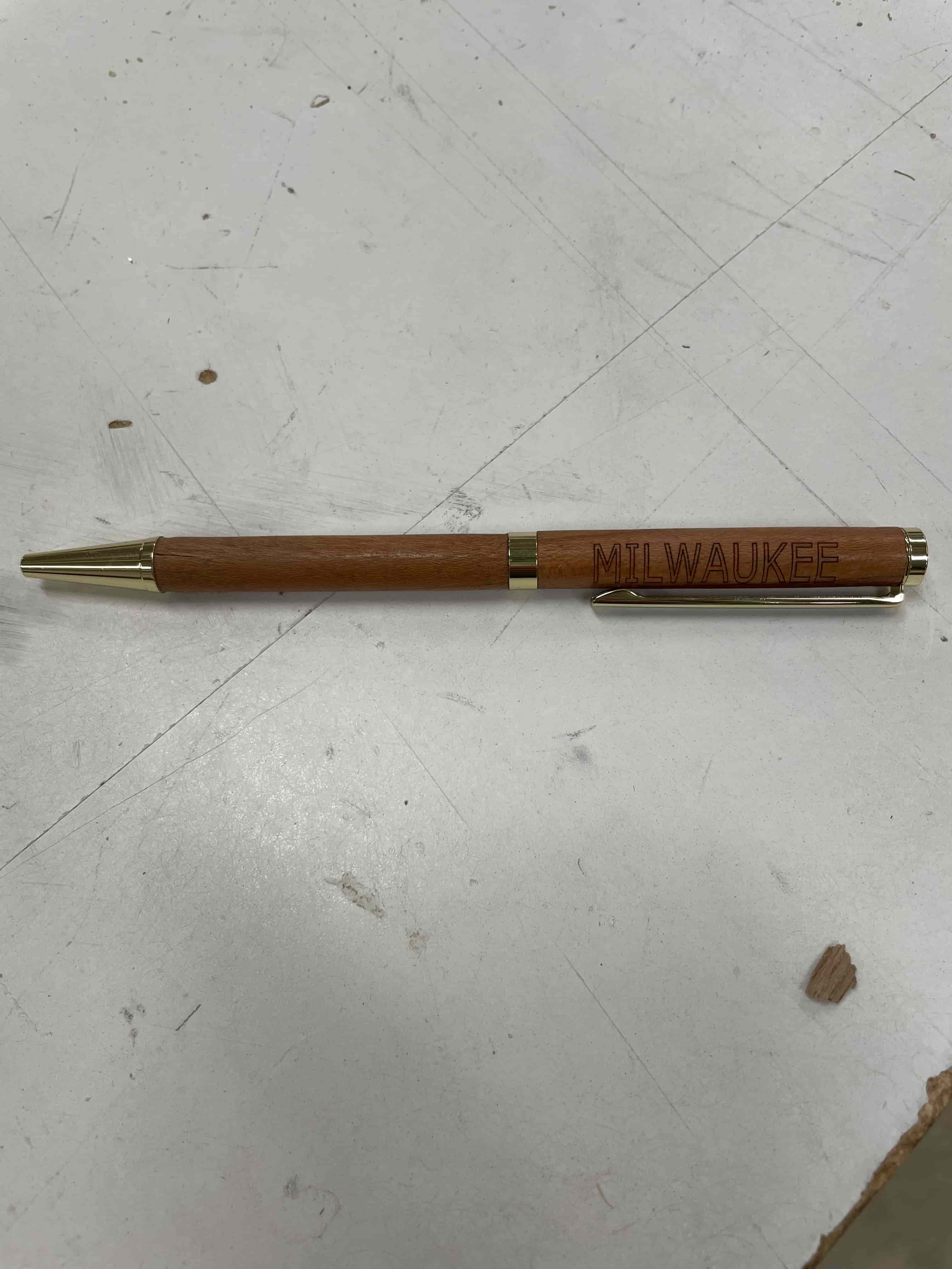 engraved wooden pen